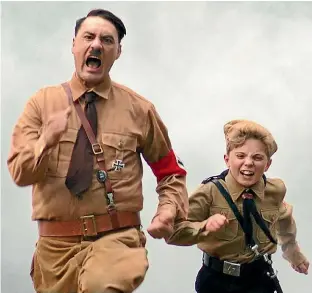  ??  ?? As Taiki Waititi, left, has said: ‘‘Isn’t it weird that in 2019 someone still has to make a movie trying to explain to people not to be a Nazi?’’