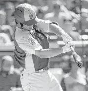  ?? Sean M. Haffey / Getty Images ?? Astros prospect Alex Bregman begins his three-hit day in the Futures Game with a first-inning triple.