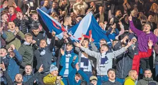  ??  ?? Dundee fans were in full voice before kick-off on Friday.