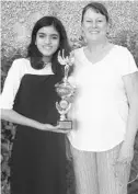  ?? COURTESY PHOTO ?? Winter Park High School student Uma Menon, left, and her Speech & Debate coach, Patti McGuire.