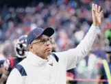  ?? BOB LEVEY/GETTY ?? Former Texans head coach David Culley waves to fans as he walks off the field after a 41-29 win against the Chargers on Dec. 26 at NRG Stadium in Houston.