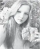  ??  ?? Ryleigh Taylor, 11, holds the fossil she discovered. TAMMY TAYLOR
