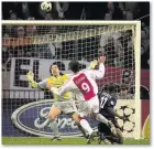  ??  ?? FIRST CLASH WITH PAT Ibrahimovi­c in action for Ajax against Vieira’s Gunners