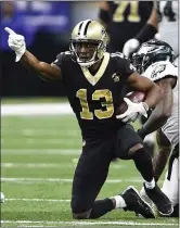  ?? BILL FEIG — THE ASSOCIATED PRESS ?? Saints wide receiver Michael Thomas celebrates a first-down reception, as New Orleans moved one step closer to the Super Bowl with a win over the Eagles.