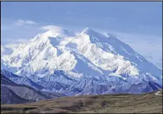  ?? BECKY BOHRER / ASSOCIATED PRESS ?? President Barack Obama on Sunday said he’s changing the name of the tallest mountain in North America from Mount McKinley to Denali.