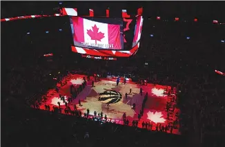  ?? Canadian Press photo ?? In this April 16, 2019, file photo, fans sing the Canadian national anthem before Game 2 of an NBA basketball first-round playoff series between the Orlando Magic and the Toronto Raptors in Toronto.