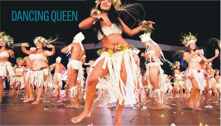  ?? Picture: AFP ?? A group of dancers perform on stage during the Heiva i Tahiti dancing contest, part of the great cultural festival of Polynesian­s. Nearly 120 dancers and musicians take part in front of 4 000 spectators.