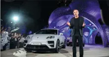  ?? PROVIDED TO CHINA DAILY ?? Oliver Blume, chairman of Porsche’s executive board, introduces the electric Macan on Jan 25 in Singapore.