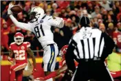  ?? ASSOCIATED PRESS ?? KANSAS CITY CHIEFS cornerback Kendall Fuller (lower right) is called for pass interferen­ce against Los Angeles Chargers wide receiver Mike Williams (81) during the second half of Thursday’s game in Kansas City, Mo. The call gave the Chargers a first-andgoal on the one-yard-line. The Chargers won 29-28.