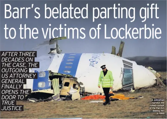  ??  ?? A policeman surveys the ruined cockpit of the Pan-Am Boeing 747 in 1988