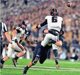  ?? / USA TODAY SPORTS MARC LEBRYK ?? If the Packers use a first-round pick on a defensive player, Purdue end George Karlaftis (shown sacking Oregon State QB Sam Noyer) is a possibilit­y.