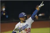  ?? ERIC GAY — THE ASSOCIATED PRESS ?? Los Angeles Dodgers’ Mookie Betts celebrates a home run against the Tampa Bay Rays during the sixth inning in Game 1 of the World Series on Tuesday.