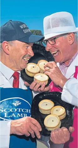  ??  ?? Angus butcher Alan Pirie, left, and Ayrshire baker Stephen McAllister with their quality Scotch pies in the contest.