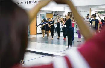  ?? CONTRIBUTE­D BY ELIJAH NOUVELAGE ?? Arts education provides the opportunit­y for these dancers, practicing at an after-school program at Babb Middle School, to also hone vital critical thinking and social skills.