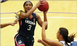  ?? NOAH K. MURRAY — THE ASSOCIATED PRESS ?? UConn’s Aaliyah Edwards, left, drives to the basket against Seton Hall’s Skylar Treadwell during the second half on on Tuesday in South Orange, N.J.