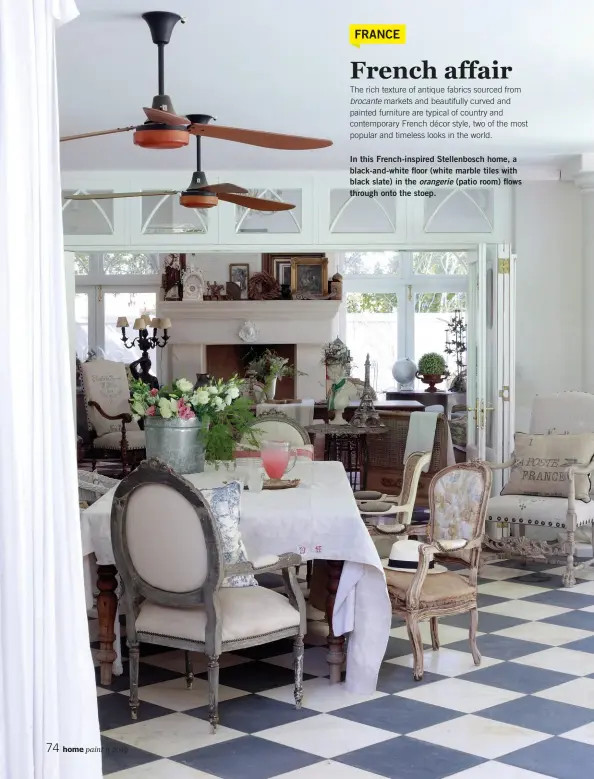  ??  ?? In this French-inspired Stellenbos­ch home, a black-and-white floor (white marble tiles with black slate) in the orangerie (patio room) flows through onto the stoep.