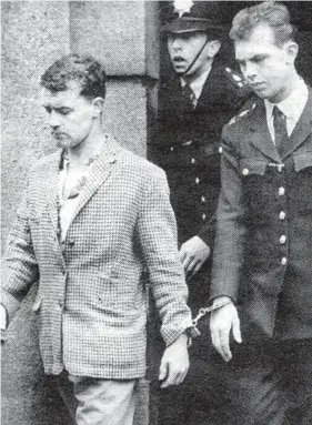  ?? ?? Russell Pascoe (left) with a prison officer