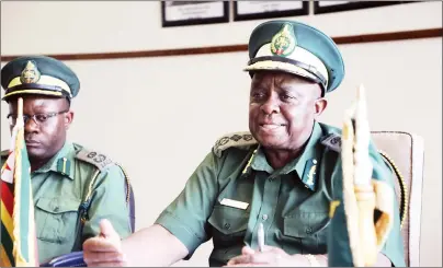  ??  ?? Zimbabwe Prisons and Correction­al Service (ZPCS) Commission­er-General Paradzai Zimondi (right) addresses journalist­s in Harare yesterday, while flanked by ZPCS deputy director (health services) Assistant Commission­er Patrick Mhaka