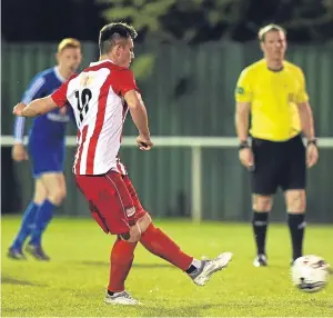  ??  ?? Spot on: Archie Macphee scores from the penalty spot for Formartine United