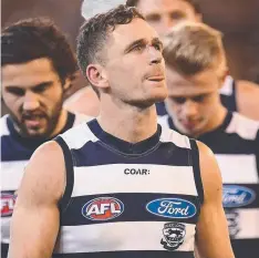  ??  ?? SHATTERED: Joel Selwood leads the Cats off the MCG on Friday.