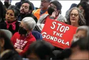  ?? SARAH REINGEWIRT­Z — STAFF PHOTOGRAPH­ER ?? People protest Frank McCourt's Dodger Stadium gondola project during a Metro Board meeting in February. Environmen­tal group is suing Metro over the project.