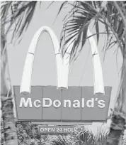  ?? Alan Diaz / Associated Press ?? McDonald’s dumped the original Dollar Menu, with items costing $1, about four years ago.