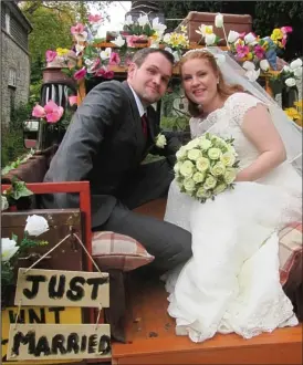  ??  ?? Budget big day: Darren and Rebecca aboard a customised Land Rover