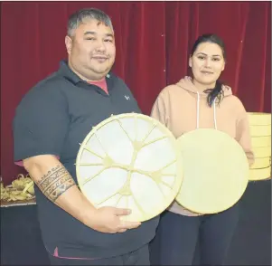  ?? NIKKI SULLIVAN/CAPE BRETON POST ?? Brian Knockwood, from Indian Brook First Nation, and Chakira Young, from Eskasoni First Nation, stand beside materials used for making hand drums. The materials were used during workshops held at the Sarah Denny Culture Centre on Nov. 18 and 19.