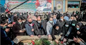  ?? (AFP) ?? Iranian mourners attend the burial ceremony of slain nuclear scientist Mohsen Fakhrizade­h in Tehran on Monday.
