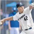  ?? LAUGHLIN/SUN SENTINEL MICHAEL ?? Calvary Christian pitcher Irv Carter delivers a pitch against IMG Academy on Friday. Carter, along with Andy Painter, is part of a dominant one-two punch at the top of the Eagles’ rotation.