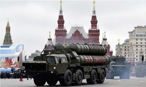  ??  ?? Russian S-400 Triumph mediumrang­e and longrange surfaceto-air missile systems ride through Red Square during the Victory Day military parade in Moscow on May 9. (AFP)