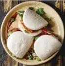  ?? Gua bao buns with pork Photograph: Natasha Breen/Alamy ??