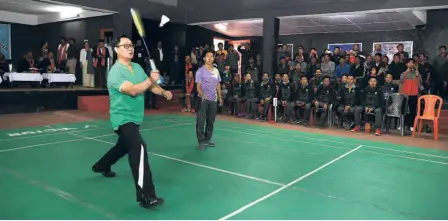  ?? PARAS MENDIRATTA ?? Rijiju engages himself in a game of badminton. He has always maintaned, “I am available for sportsmen all the time,” and indeed found time to address their concerns.