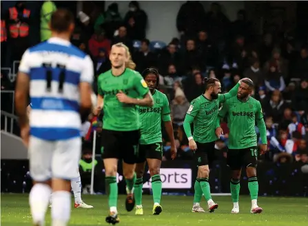  ?? ?? STRIKE ONE: Tyrese Campbell is congratula­ted after scoring Stoke City’s first goal at QPR on Sunday.