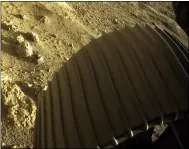  ?? NASA — JPL-CALTECH VIA AP ?? One of the six wheels on the Perseveran­ce Mars rover is shown Thursday, Feb. 18.