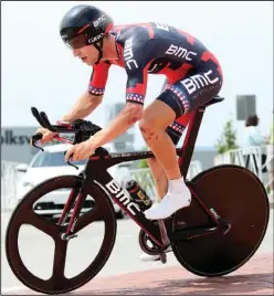  ??  ?? Taylor Phinney rounds a curve at the USA Cycling pro time trial championsh­ips at the Chattanoog­a Volkswagen plant Saturday. He was the winner in 37:48.