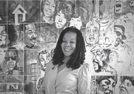  ?? PHOTOS BY SARAHBETH MANEY/DETROIT FREE PRESS ?? Denise Crittendon, shown during a March 30 book signing at the Charles H. Wright Museum in Detroit, spent more than eight years writing her now-published novel, “Where it Rains in Color.”