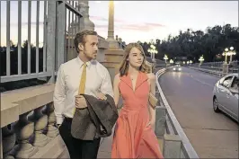  ?? DALE ROBINETTE / LIONSGATE ?? Ryan Gosling as Sebastian and Emma Stone as Mia in a scene from the movie “La La Land,” directed by Damien Chazelle.