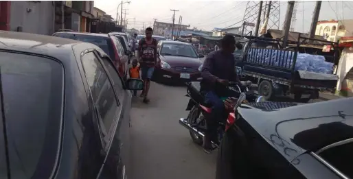  ??  ?? Motorists trapped on Ayodele Okeowo Street, Soliyi