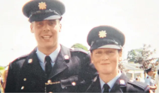  ??  ?? ‘We clicked’: Adrian and Caroline Donohoe pictured on the day they graduated together from the Garda Training College in Templemore