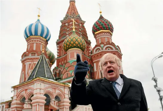  ?? GETTY IMAGES ?? Boris Johnson speaks to the media outside St Basil’s Cathedral in Moscow. His visit to Russia is the first in five years by a British foreign secretary.