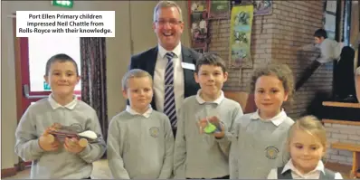  ??  ?? Port Ellen Primary children impressed Neil Chattle from Rolls-Royce with their knowledge.