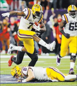  ?? BOB LEVEY/ THE ASSOCIATED PRESS FILE ?? Louisiana State running back Leonard Fournette, shown against Texas Tech on Dec. 29 in Houston, leads the Tigers into Lambeau Field in Green Bay, Wis., on Saturday as 10½-point favorites against Wisconsin.