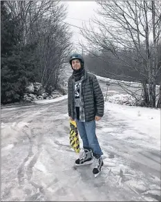  ?? CONTRIBUTE­D ?? Michael Picard found a clever way to salt the driveway — he strapped on a pair of skates.