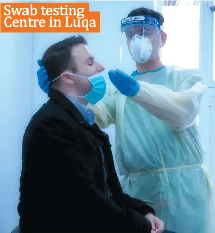  ?? Photo: Michael Camilleri ?? A demonstrat­ion of swab testing for the coronaviru­s is shown to the media at the Luqa centre