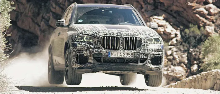  ?? — PHOTOS: BMW ?? Since its debut in 1999, the X5 has been ahead of the pack. With competitio­n improving, BMW has stepped up its game with the fourth-generation SUV.