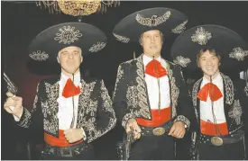  ?? FRANKIE ZITHS / THE ASSOCIATED PRESS FILES ?? Steve Martin, left, Chevy Chase and Martin Short dressed up for the 1986 première of Three Amigos!