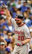  ?? PAUL BEATY / AP ?? The Nationals’ Daniel Murphy celebrates his second home run of the game in Friday’s win over the Cubs.