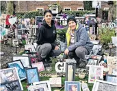  ??  ?? One year on: Fans Tonia Katsantoni­s, left, and Helen Feichtinge­r in the garden paying tribute to George Michael, right, in Highgate, London