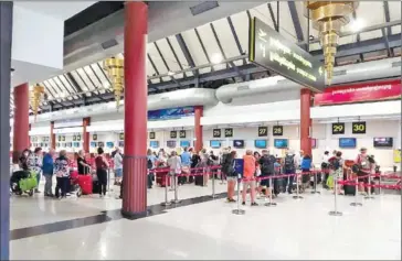  ?? SUPPLIED ?? Passengers at Siem Reap Internatio­nal Airport. Cambodia will enforce entry restrictio­ns on all foreigners from midnight on Monday to reduce and contain the transmissi­on of Covid-19.